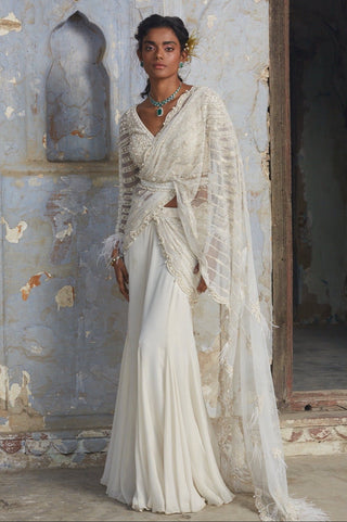 Ivory nihaar feather embellished saree set by Nitika Gujral at Mrs. G