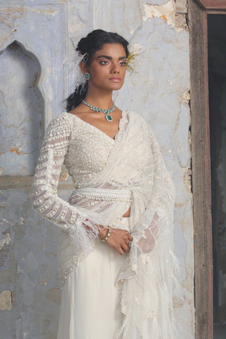 Ivory nihaar feather embellished saree set by Nitika Gujral at Mrs. G