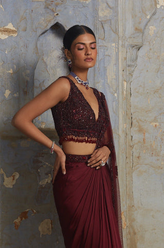Maroon nihaar sequin beadwork saree set by Nitika Gujral at Mrs. G