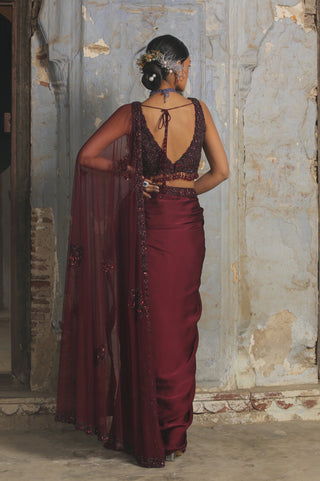 Maroon nihaar sequin beadwork saree set by Nitika Gujral at Mrs. G