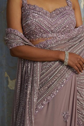 Purple nihaar resham beadwork saree set by Nitika Gujral at Mrs. G