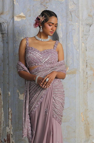 Purple nihaar resham beadwork saree set by Nitika Gujral at Mrs. G