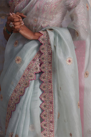 Green nihaar dabka embroidered saree set by Nitika Gujral at Mrs. G