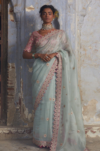 Green nihaar dabka embroidered saree set by Nitika Gujral at Mrs. G