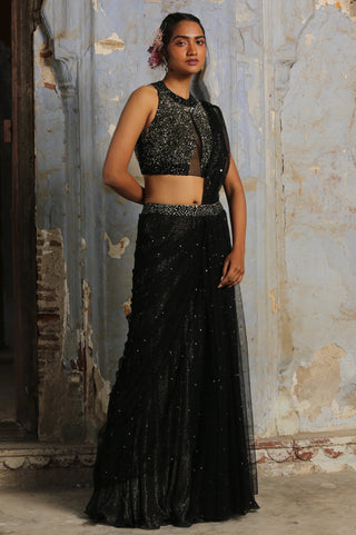 Black nihaar feather fringe saree set by Nitika Gujral at Mrs. G