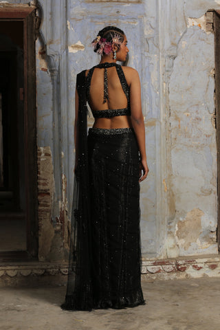 Black nihaar feather fringe saree set by Nitika Gujral at Mrs. G