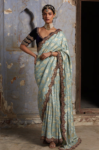 Green nihaar banarasi velvet saree set by Nitika Gujral at Mrs. G