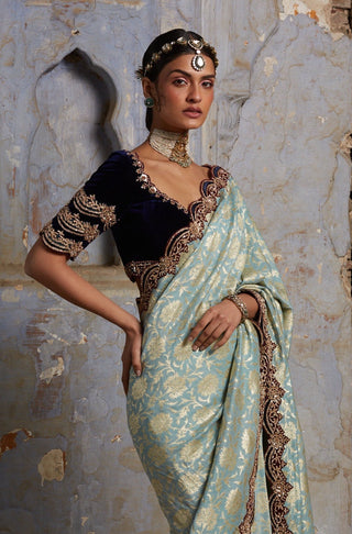 Green nihaar banarasi velvet saree set by Nitika Gujral at Mrs. G