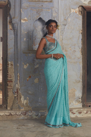 Blue nihaar chiffon sequin saree set by Nitika Gujral at Mrs. G