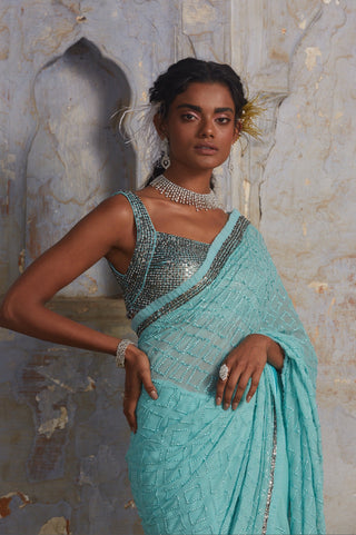 Blue nihaar chiffon sequin saree set by Nitika Gujral at Mrs. G