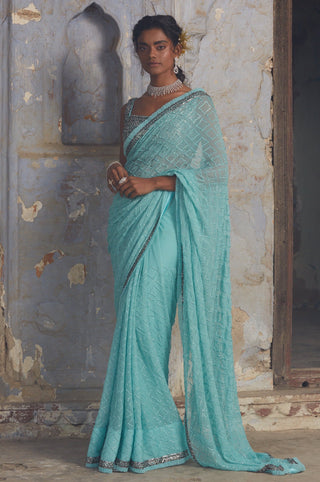 Blue nihaar chiffon sequin saree set by Nitika Gujral at Mrs. G