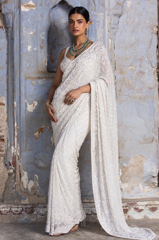 Ivory nihaar sequin saree set by Nitika Gujral at Mrs. G
