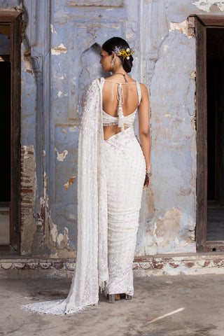 Ivory nihaar sequin saree set by Nitika Gujral at Mrs. G