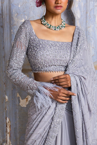 Gray nihaar feather fringe saree set by Nitika Gujral at Mrs. G