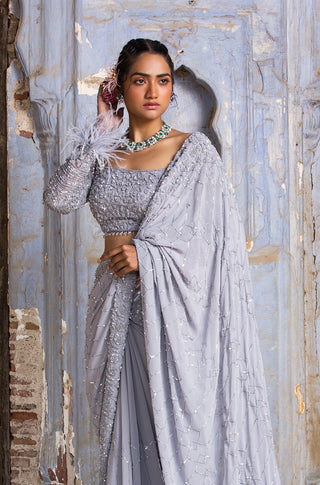 Gray nihaar feather fringe saree set by Nitika Gujral at Mrs. G