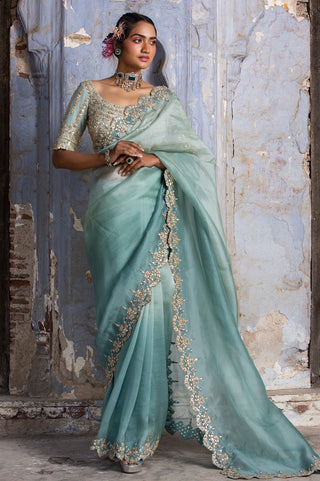 Green nihaar antique zari mirror saree set by Nitika Gujral at Mrs. G