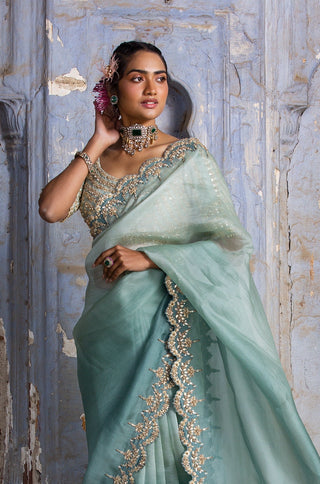 Green nihaar antique zari mirror saree set by Nitika Gujral at Mrs. G
