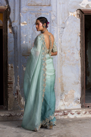 Green nihaar antique zari mirror saree set by Nitika Gujral at Mrs. G