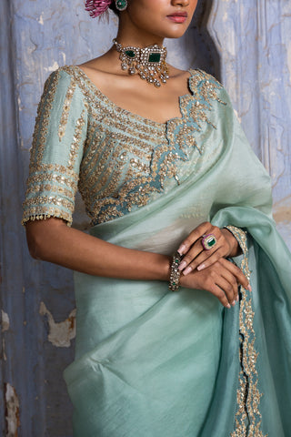 Green nihaar antique zari mirror saree set by Nitika Gujral at Mrs. G