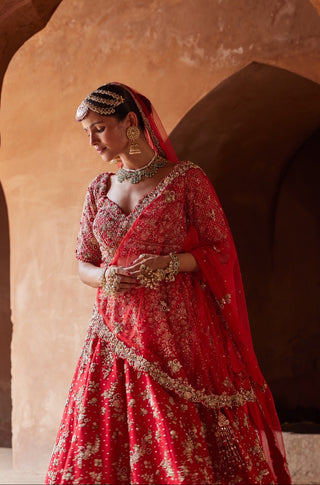 Red tarana floral embroidered lehenga set by Nitika Gujral at Mrs. G