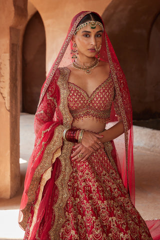 Red tarana jhoomar lehenga set by Nitika Gujral at Mrs. G