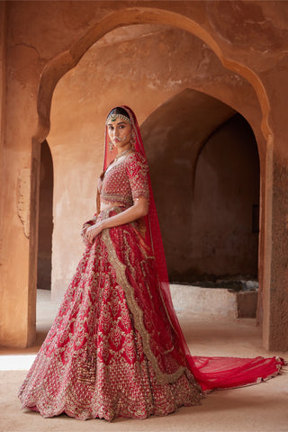 Red tarana jhoomar lehenga set by Nitika Gujral at Mrs. G