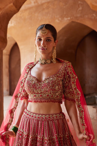 Red tarana raw silk lehenga set by Nitika Gujral at Mrs. G