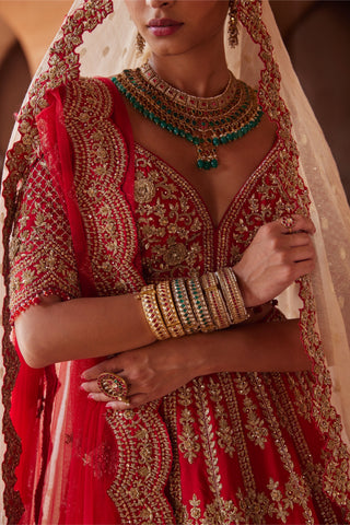 Red tarana floral lehenga set by Nitika Gujral at Mrs. G