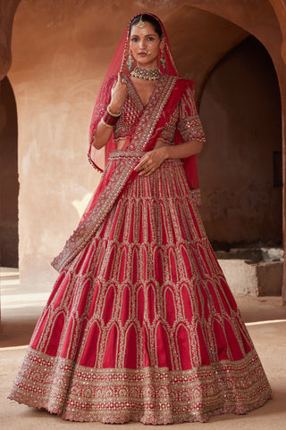 Red tarana zardozi raw silk lehenga set by Nitika Gujral at Mrs. G