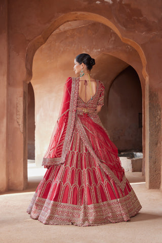 Red tarana zardozi raw silk lehenga set by Nitika Gujral at Mrs. G