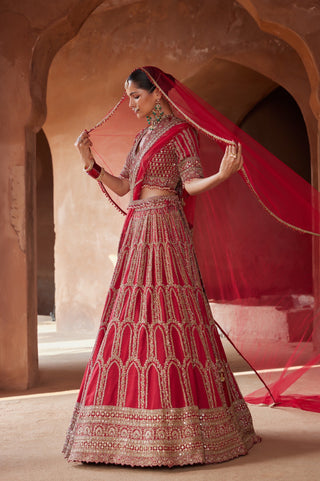 Red tarana zardozi raw silk lehenga set by Nitika Gujral at Mrs. G