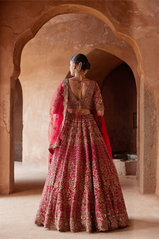Red tarana embroidered raw silk lehenga set by Nitika Gujral at Mrs. G
