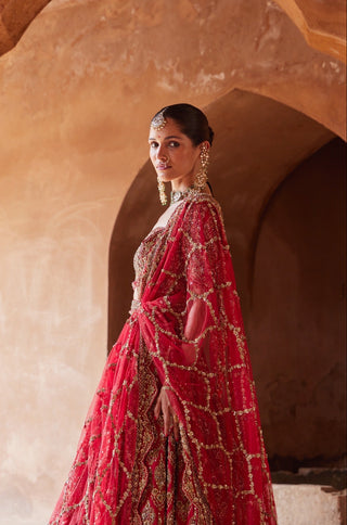 Red tarana embroidered lehenga set by Nitika Gujral at Mrs. G