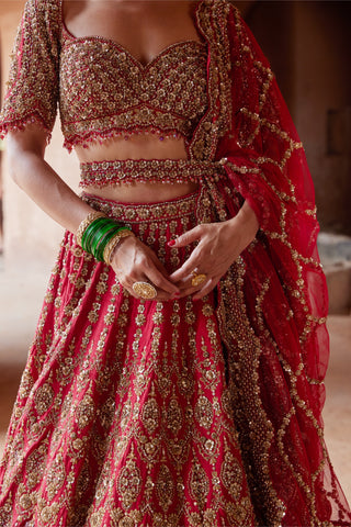 Red tarana embroidered lehenga set by Nitika Gujral at Mrs. G