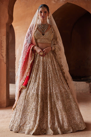 Gold tarana embroidered lehenga set by Nitika Gujral at Mrs. G