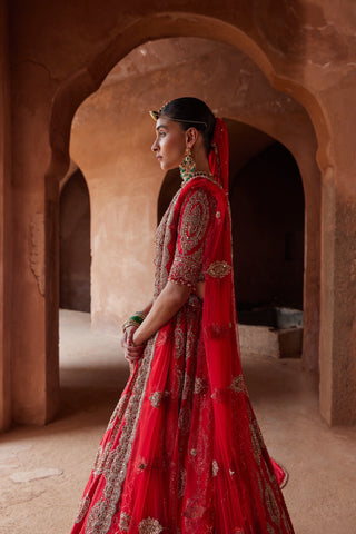 Red tarana lehenga set by Nitika Gujral at Mrs. G