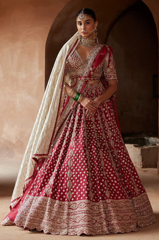 Maroon tarana raw silk lehenga set by Nikita Gujral at Mrs. G