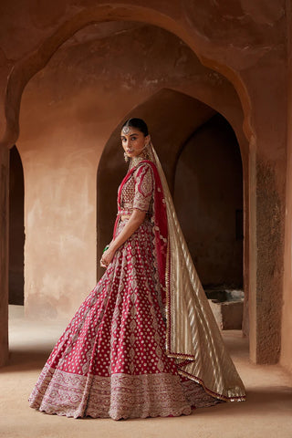 Maroon tarana raw silk lehenga set by Nikita Gujral at Mrs. G