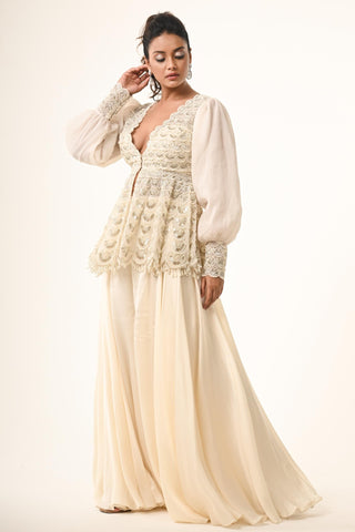 Ivory peplum top with flared pant