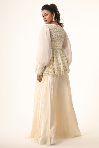 Ivory peplum top with flared pant