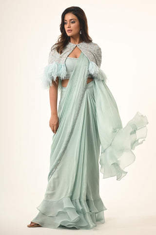 Blue ruffle saree with embroidered cape
