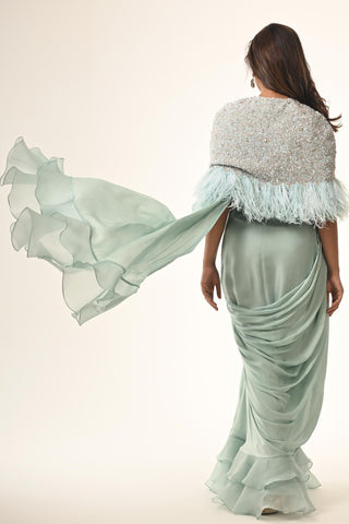 Blue ruffle saree with embroidered cape