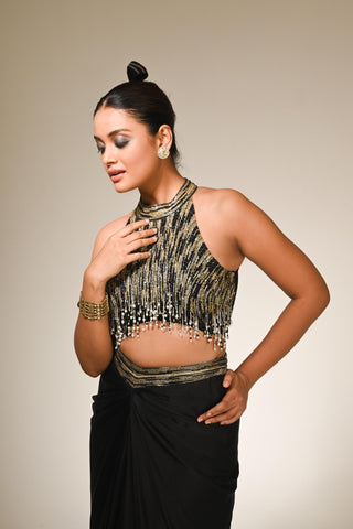 Black sequence blouse with rape skirt