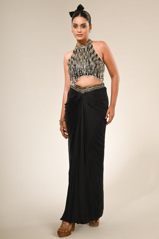 Black sequence blouse with rape skirt