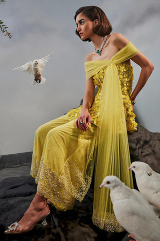 Yellow amour peplum top with trousers and shoulder drape