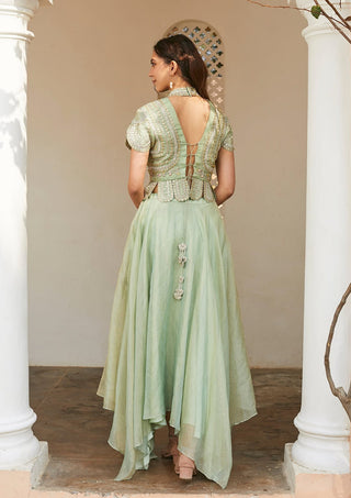 Back view of frost blue top with lace-up V-back and skirt with a tassel at the waist by Osaa by Adarsh at Mrs. G