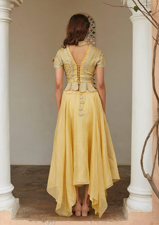 Back view of taupe lemon top with lace-up V-back and skirt with a tassel at the waist by Osaa by Adarsh at Mrs. G