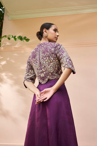 Back view of aubergine embroidered top with scalloped sleeves and skirt by Osaa by Adarsh at Mrs. G