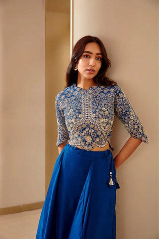 Close-up of jade blue scalloped top with silver and gold zardozi on the bodice and sleeves by Osaa by Adarsh at Mrs. G