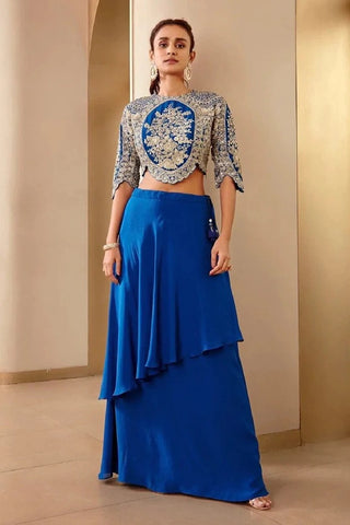 Front view of jade blue top with oval floral tree embroidery and layered asymmetrical skirt by Osaa by Adarsh at Mrs. G